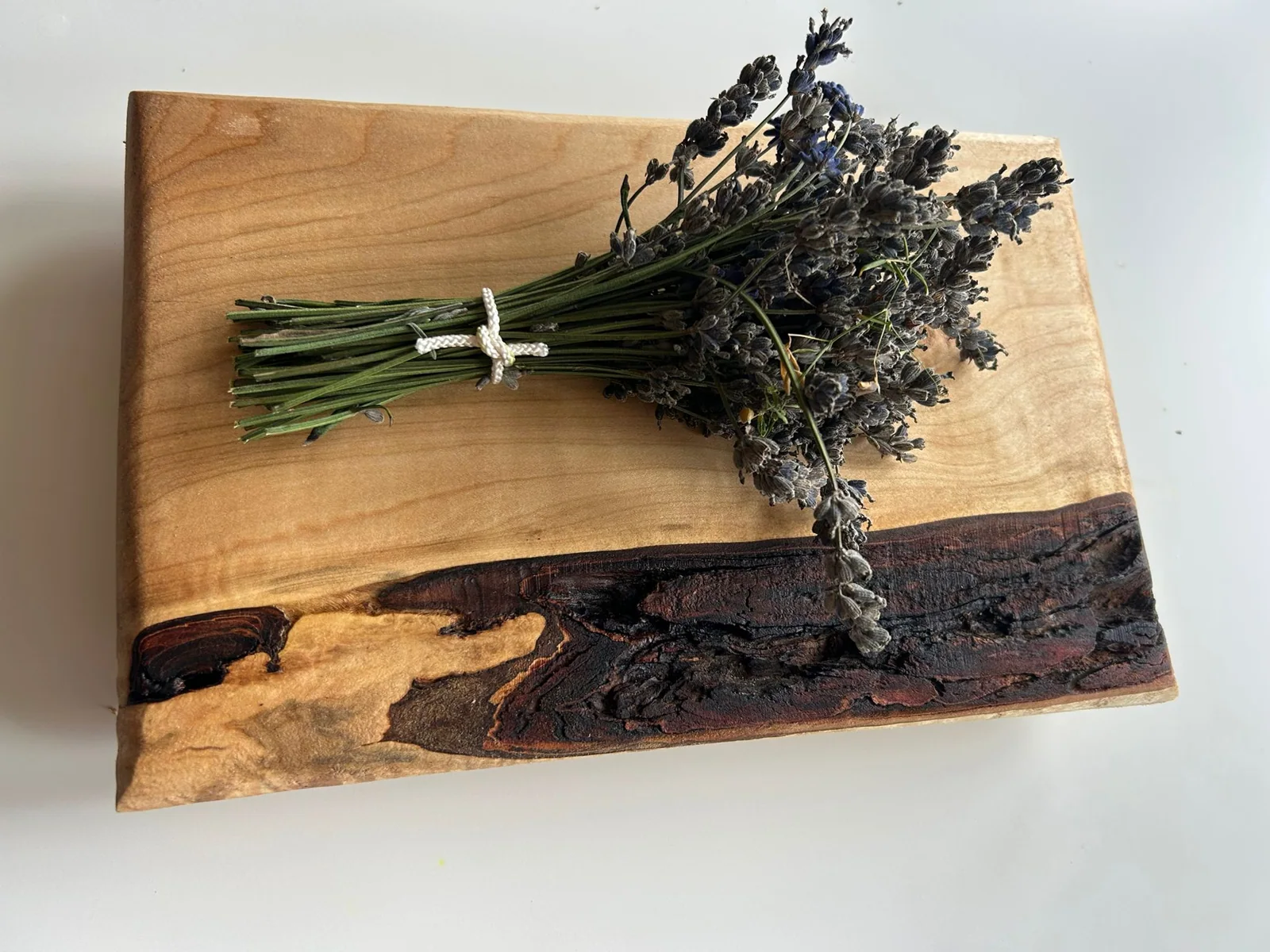 Natural handcrafted live-edge wood board with lavender